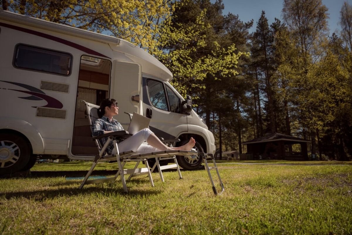 woman checking the status of their RV park website 