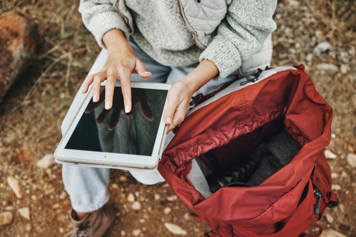 woman using a point of sale system for campgrounds 