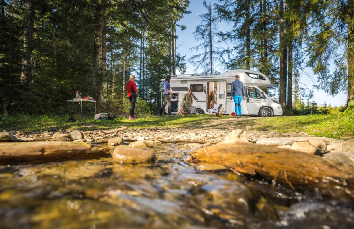 a recreational camper near a lake for one of the top campground management companies 