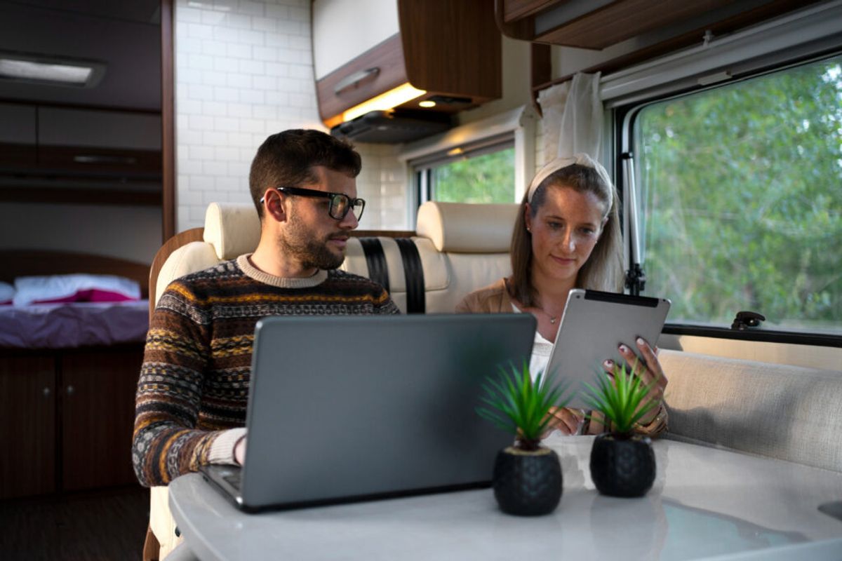 a couple checking their recommendation with the best rv park consultants 