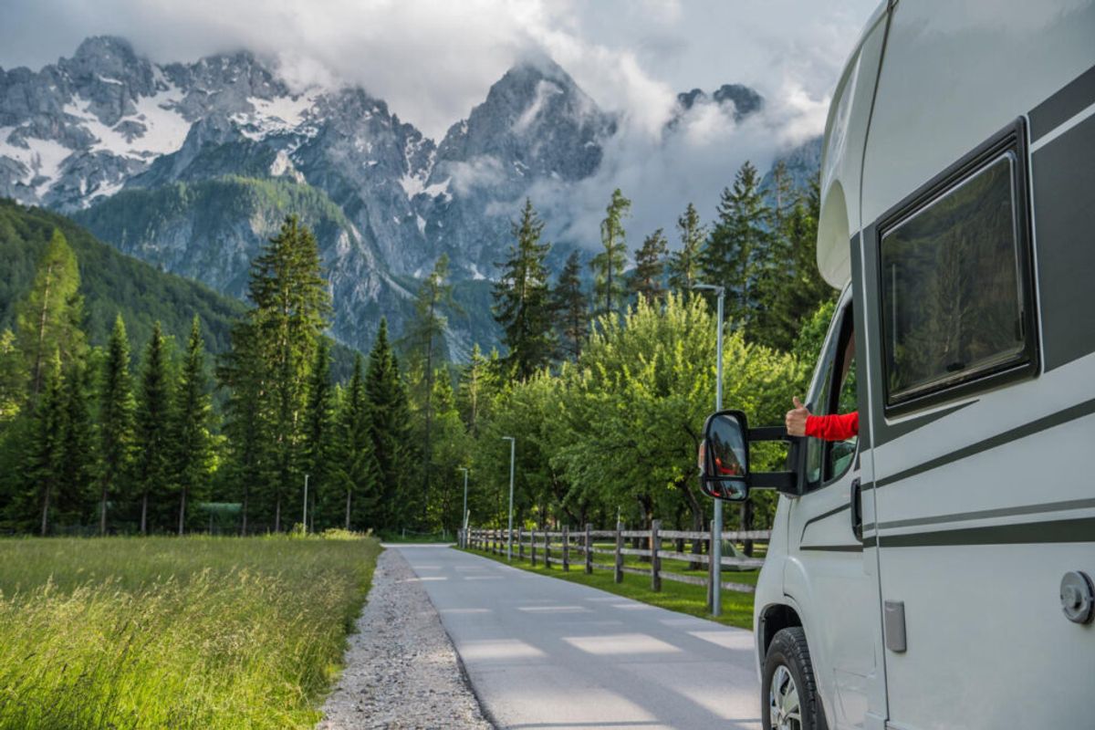 a man traveling to his next rv park spot reserved using campground registration software 