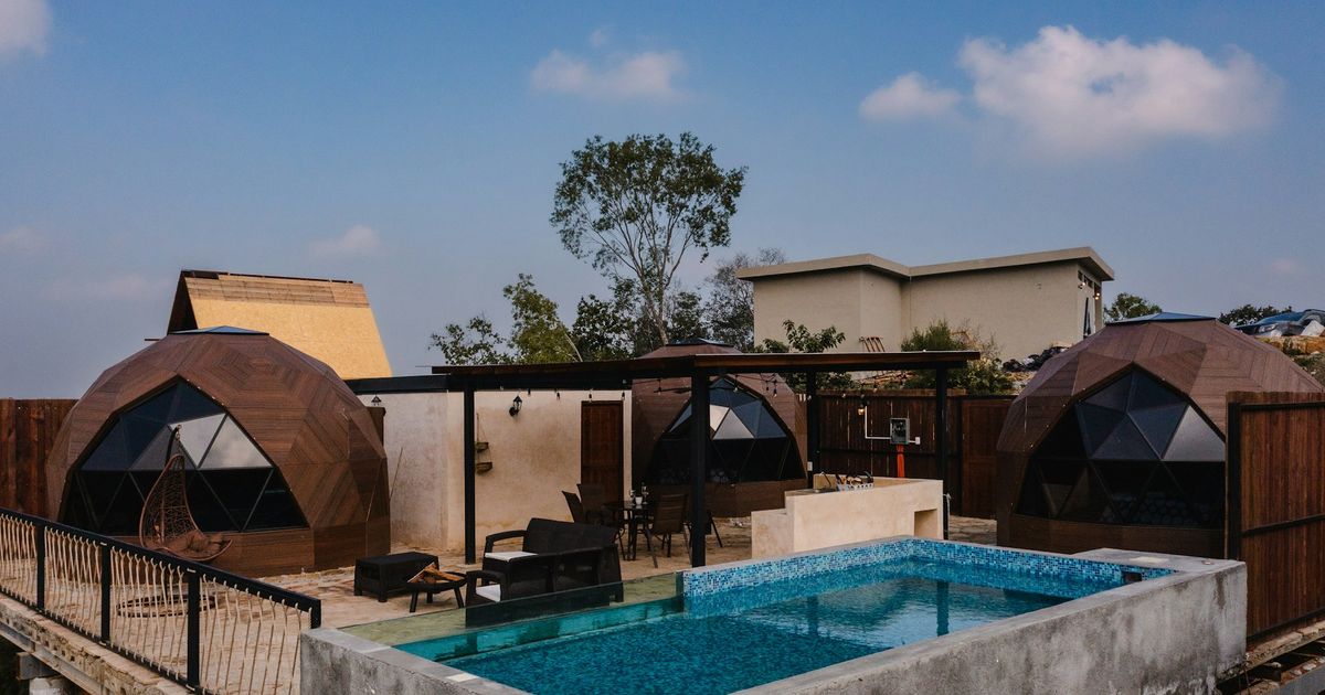 A glamping site with a pool