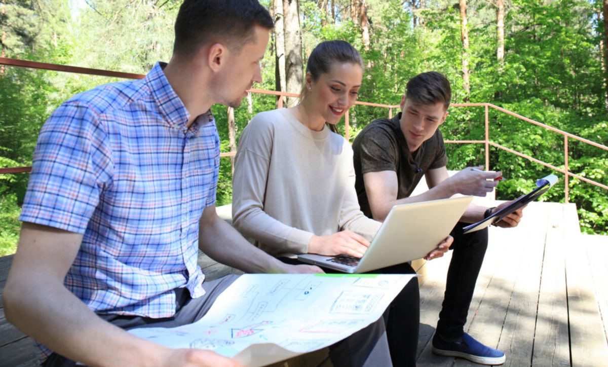 three people planning their campground management 