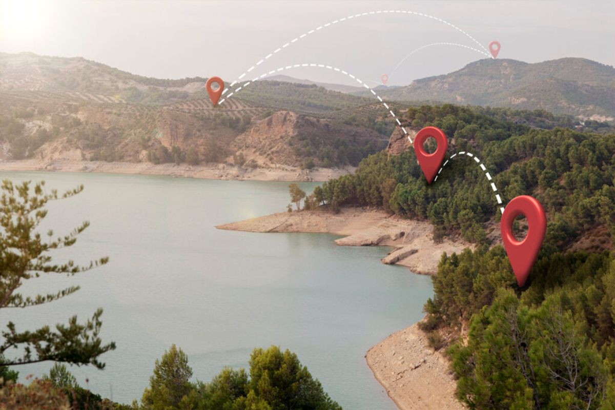 a mountain with diferent red pinpoint locations of campgrounds 