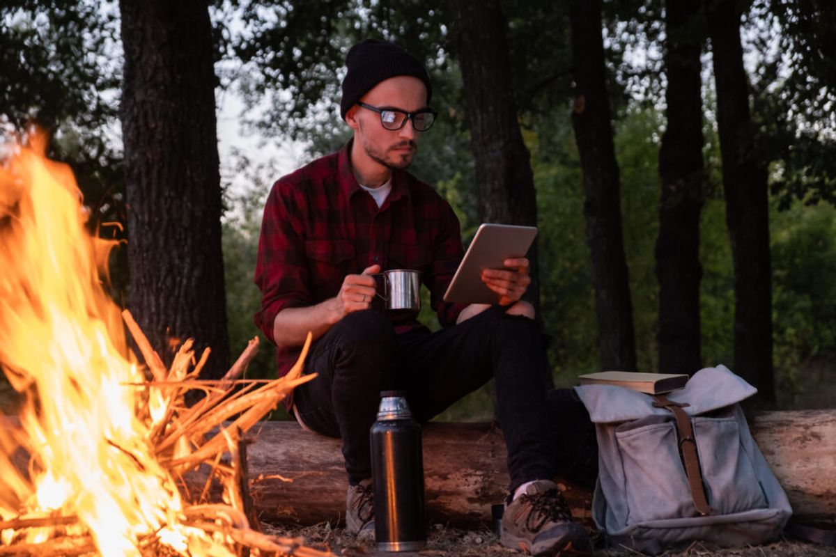 man using a promo code for a campground stay 