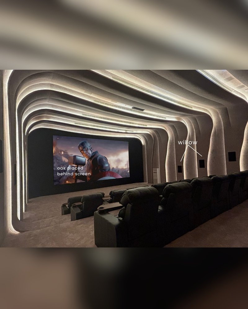 Sculptural private home cinema with tiered lighting, XSCACE Oak speakers behind the screen and Willow speakers on the side walls