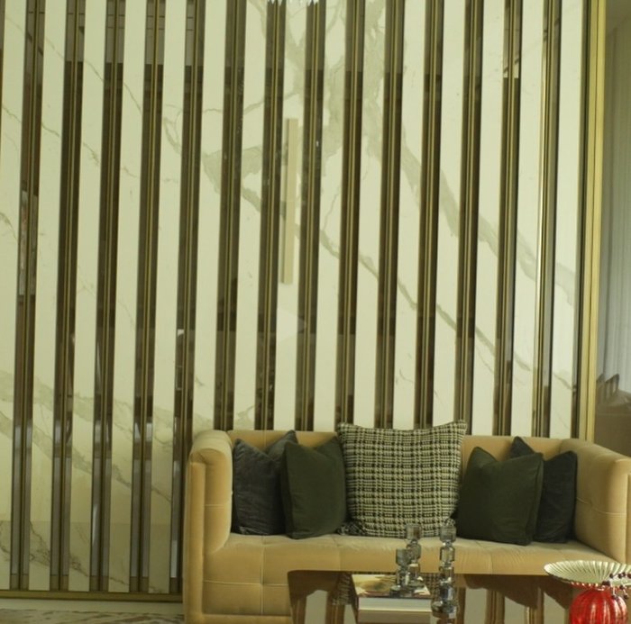 Case Study: QuadCane on a Marble and Brass Feature Wall