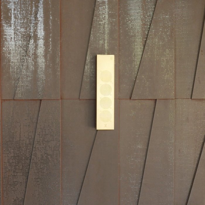 Case Study: Cane on a Corten Steel and Stone Facade