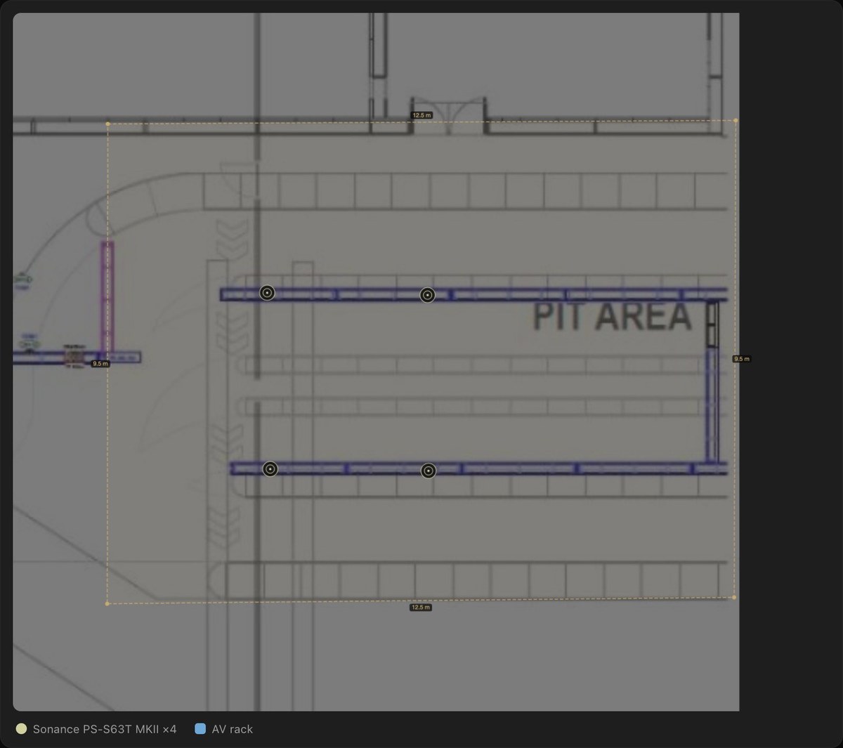Floor plan of the F1 Drive pit area, a meeting zone with four pendant speakers over the architectural drawing
