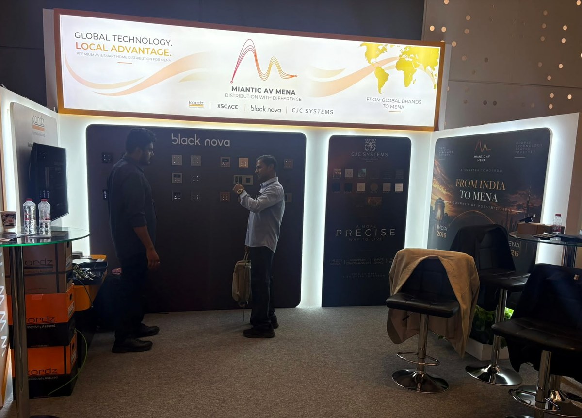 The Miantic AV MENA stand at the High End and Smart Home Show in Dubai, with the brand banner listing XSCACE