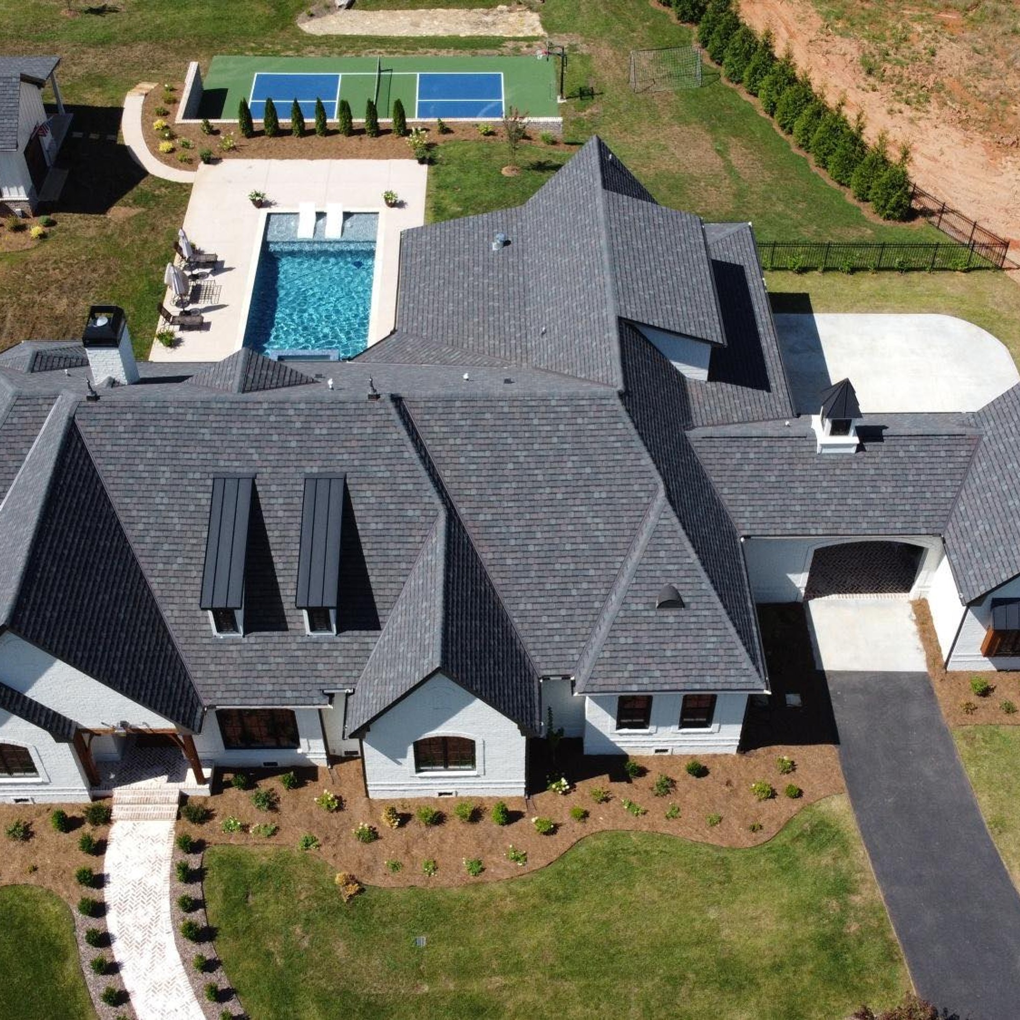 Omnia Exterior Solutions — unified media strategy across 11 roofing companies