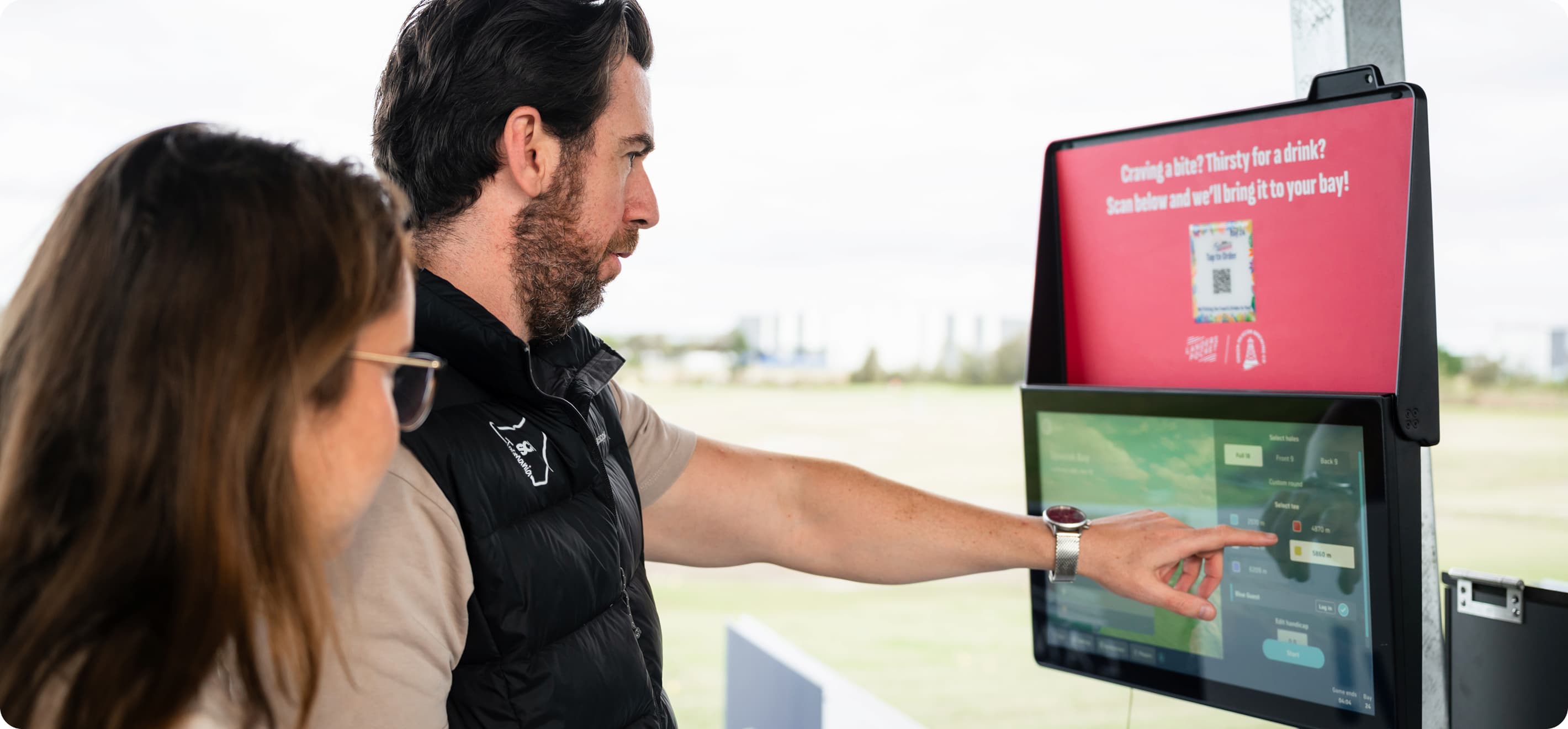 Man pointing at screen