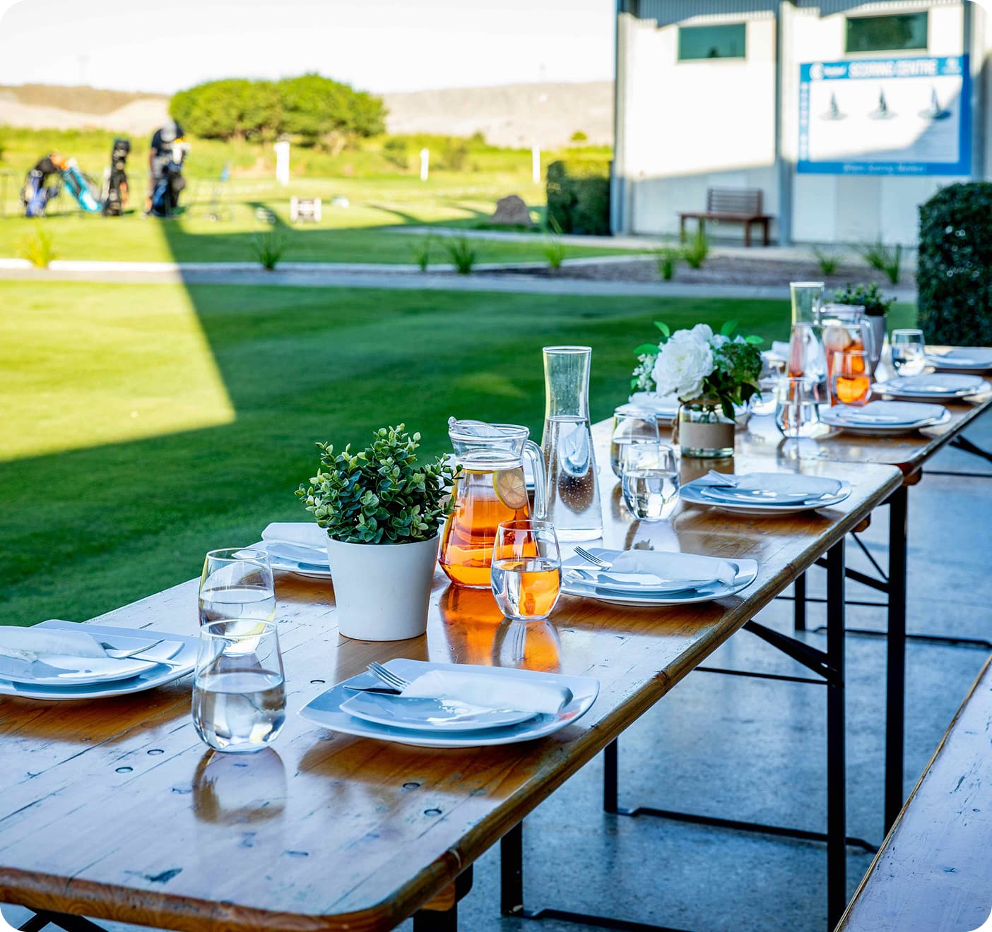 Set up dining table near the golf course.