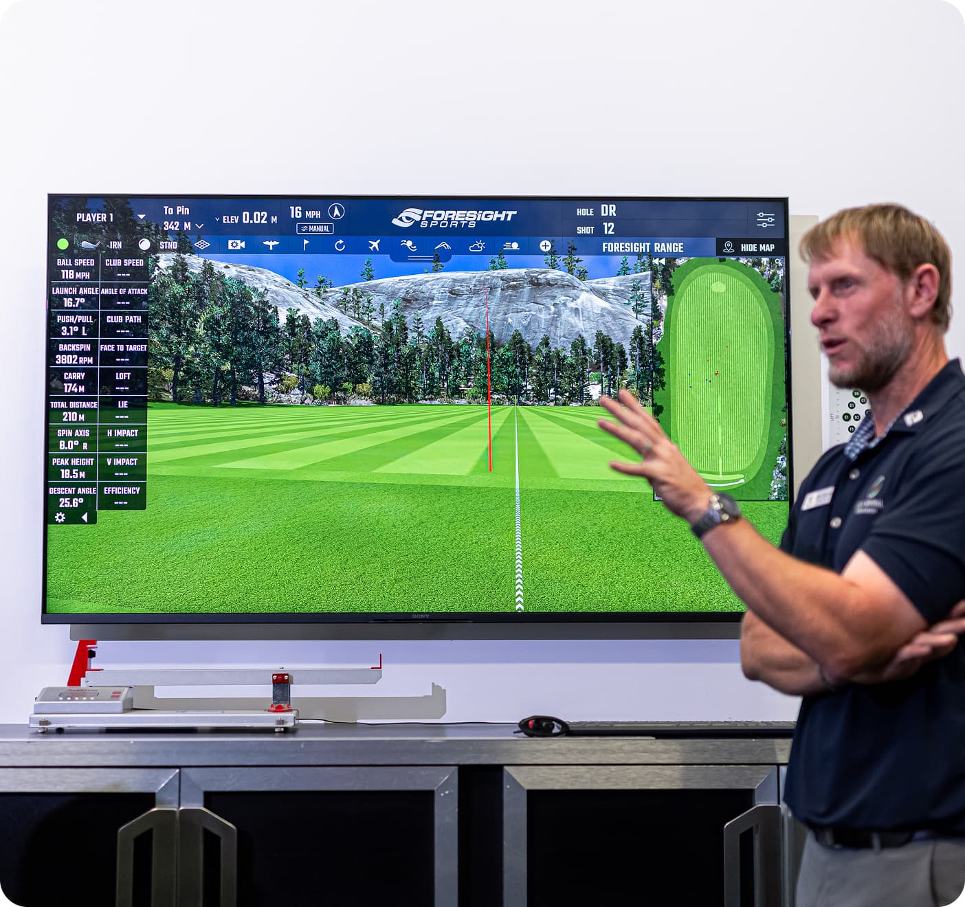 Man in front of screen