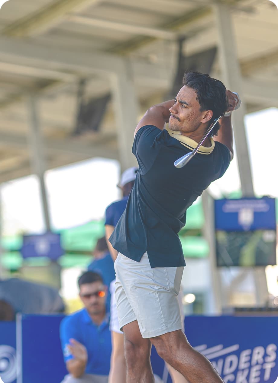 Man swinging golf club