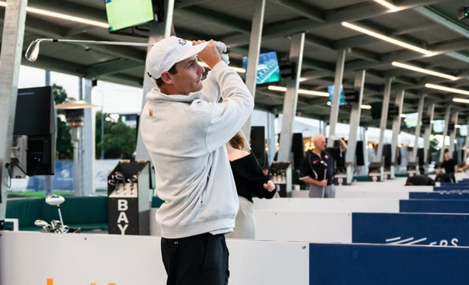 Man swinging golf club