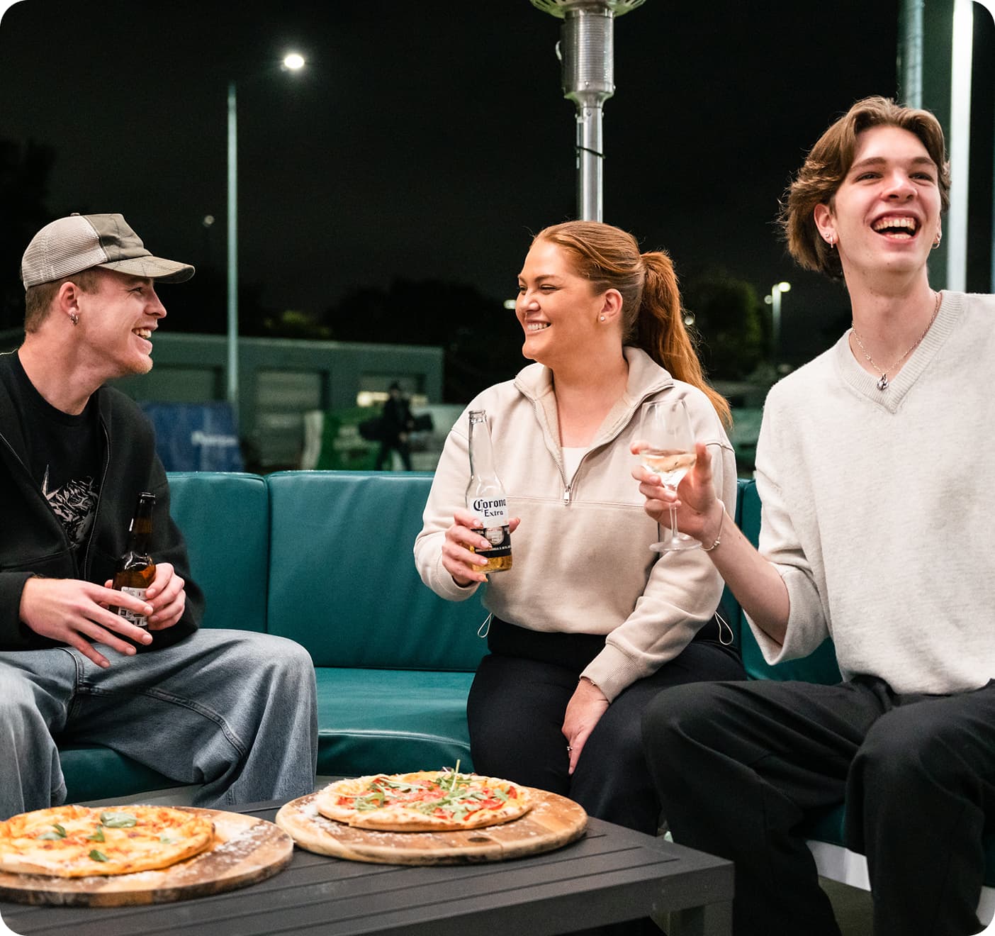 Three people drinking at event