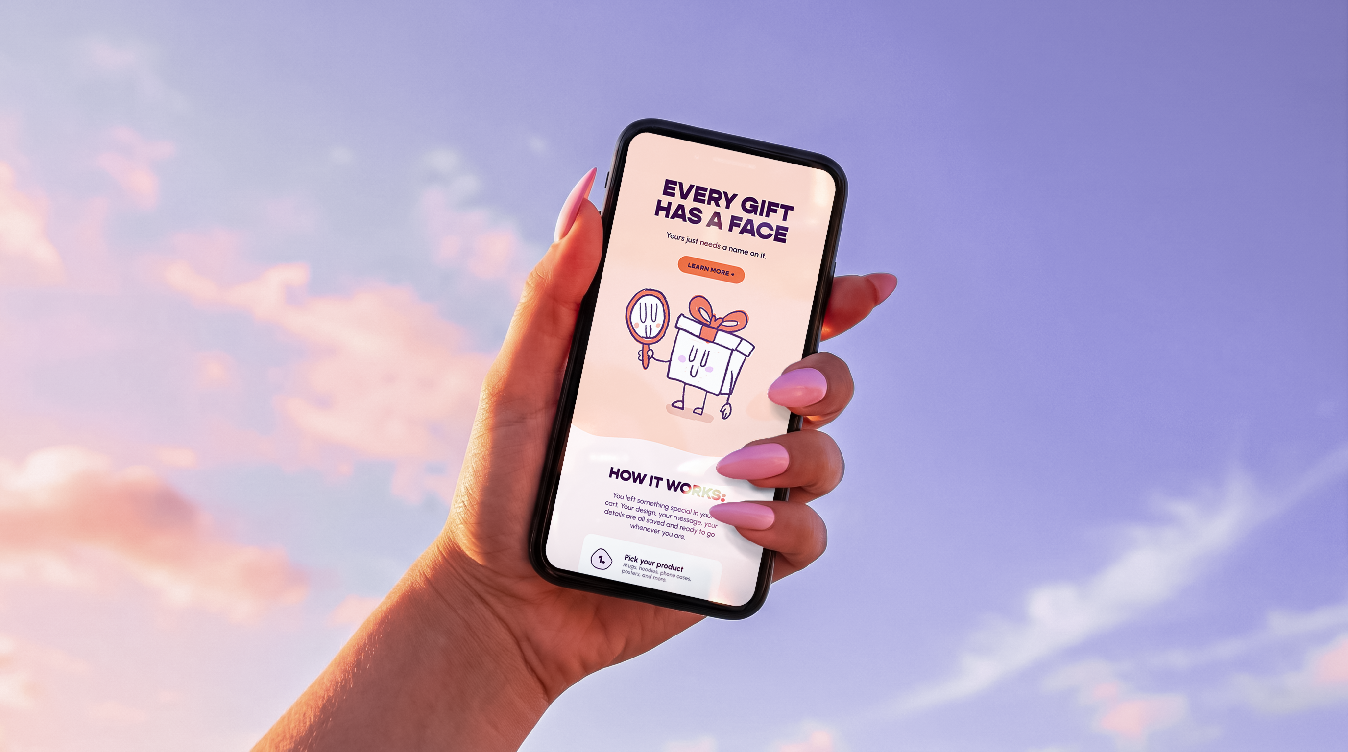 hey dear email on a phone. the phone is in a woman's hand against a blue clear sky