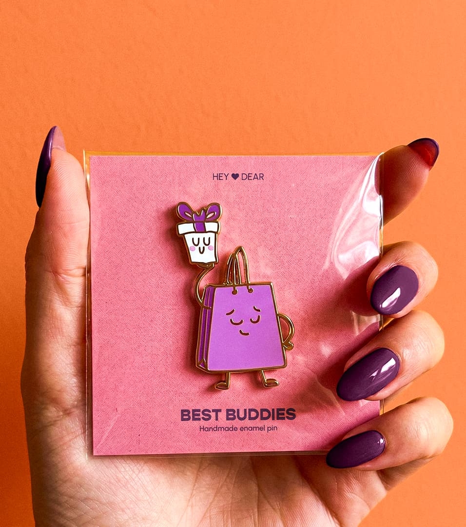 "best buddies" pin, application of one of the illustrations developed in the set