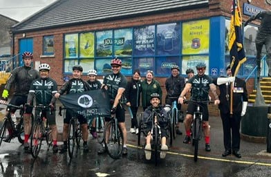 The team and standard bearer at the Carlisle start