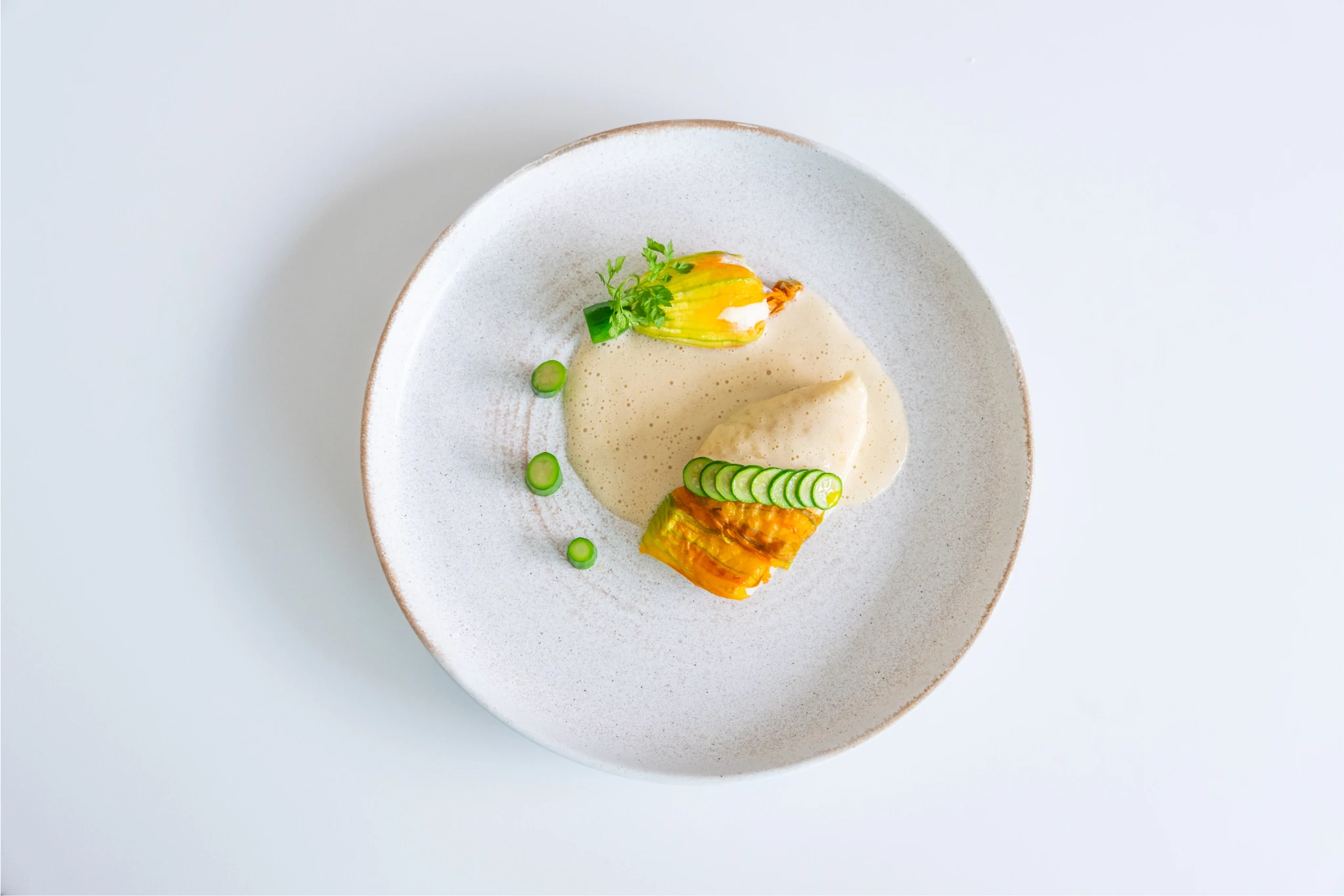 Turbot and courgette flower overhead