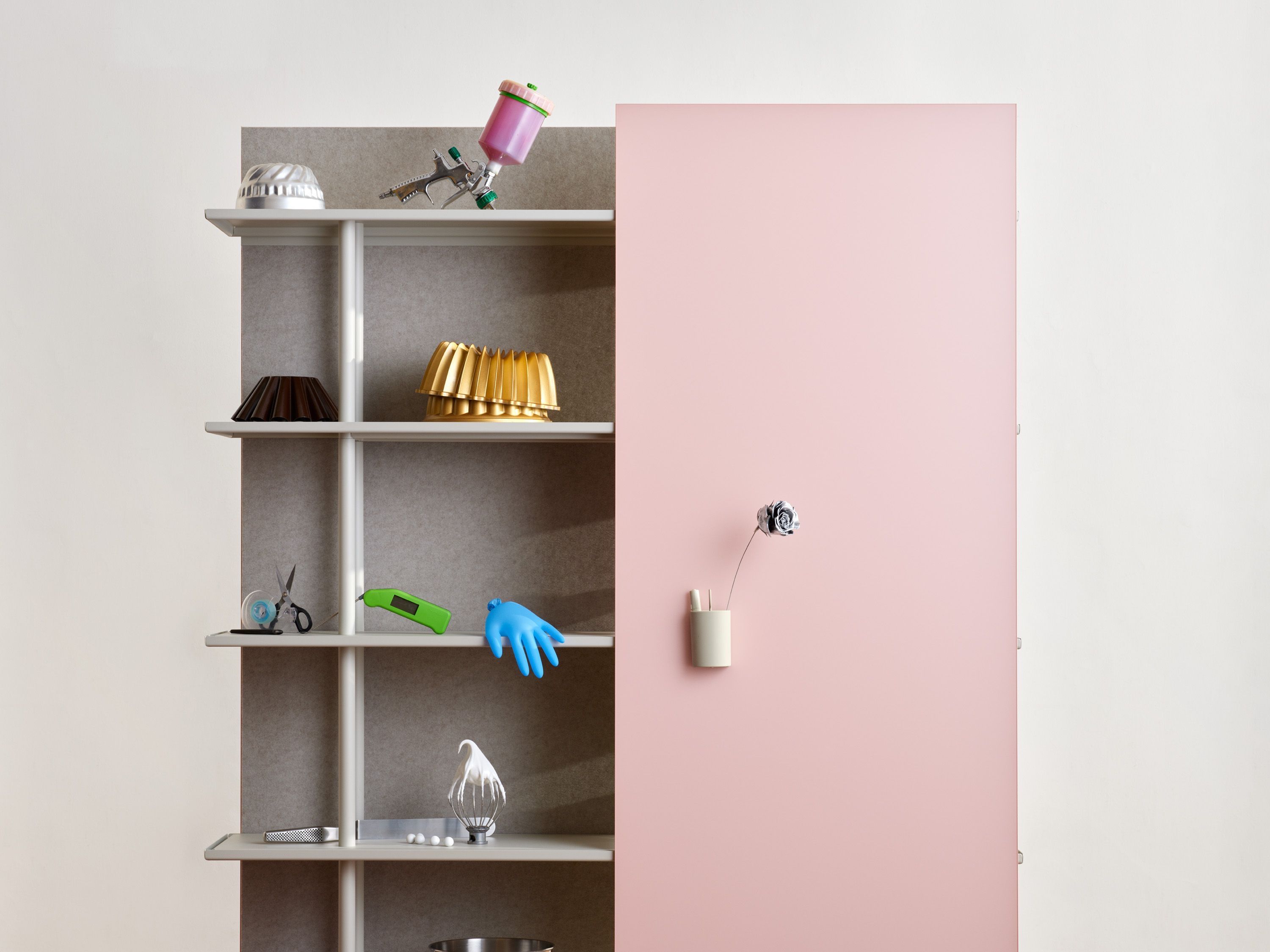 A pink A08 with pastries and cakes by Elle Azhdari on the shelves