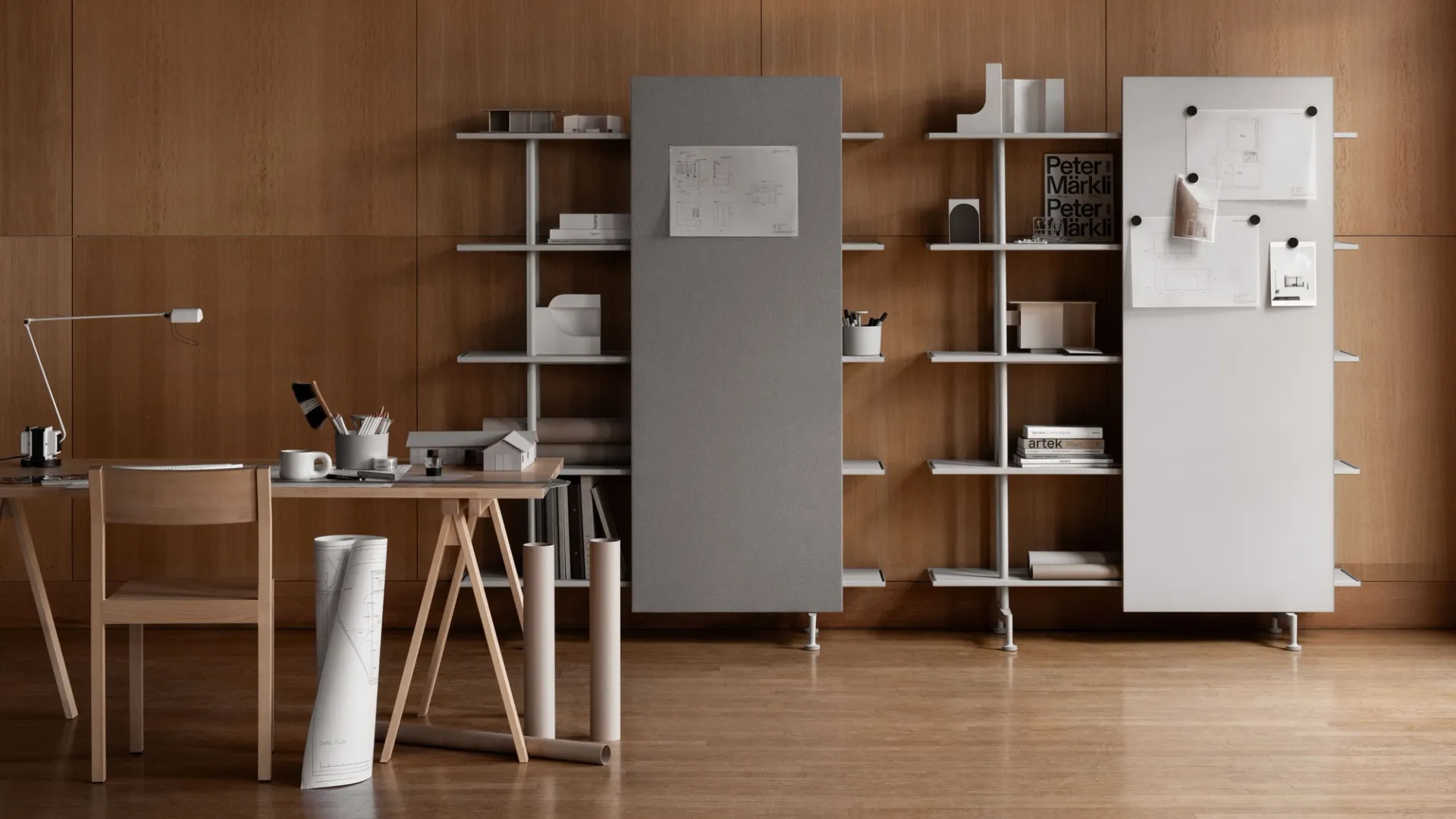A08 shelving system with a grey noticeboard and a white whiteboard in a studio with wooden panelling, a desk and rolled drawings