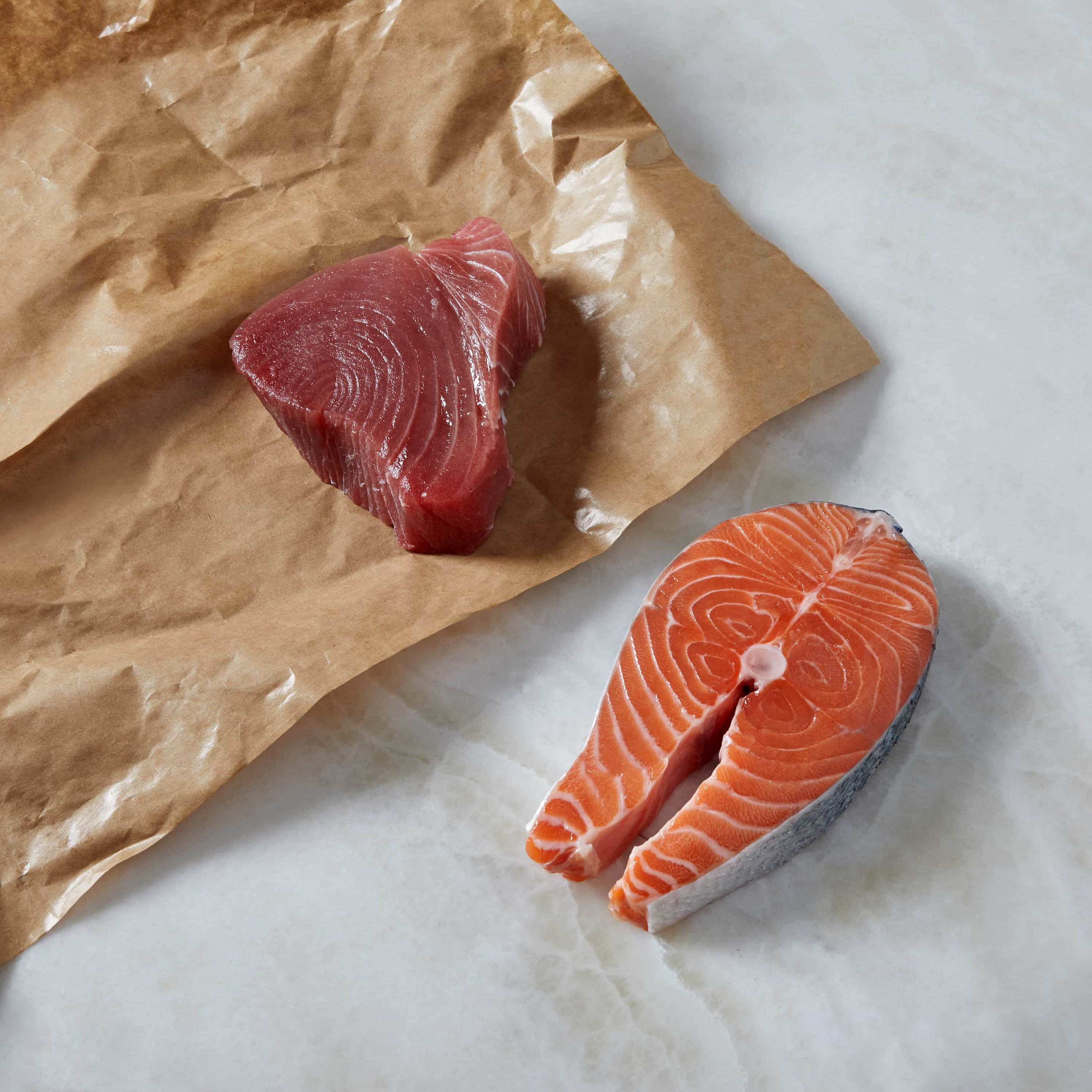 Raw tuna fillet and raw salmon fillet