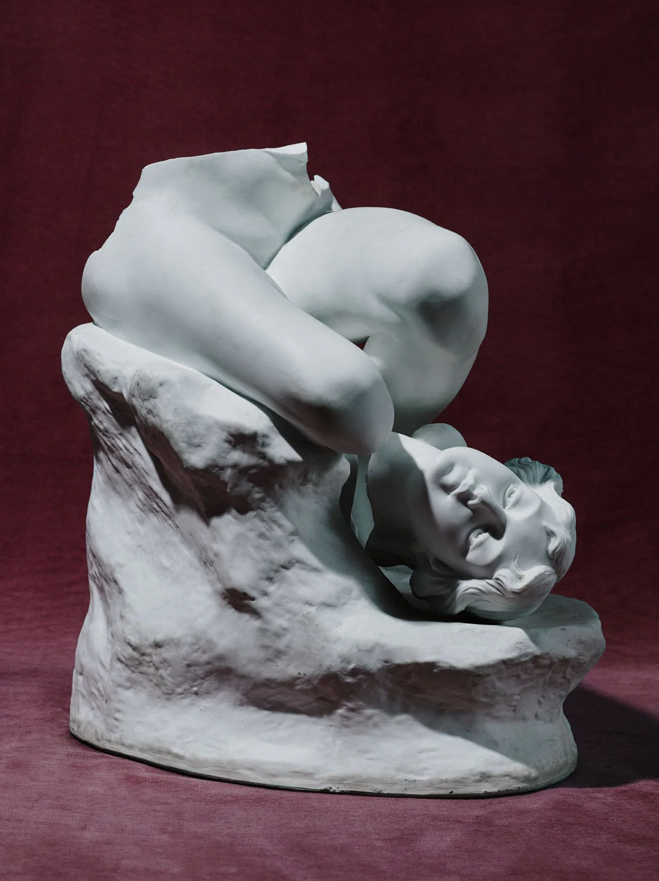 White sculpture of man, broken, for Romance Journal Issue 02. Publication design, art direction, print design by RoAndCo.