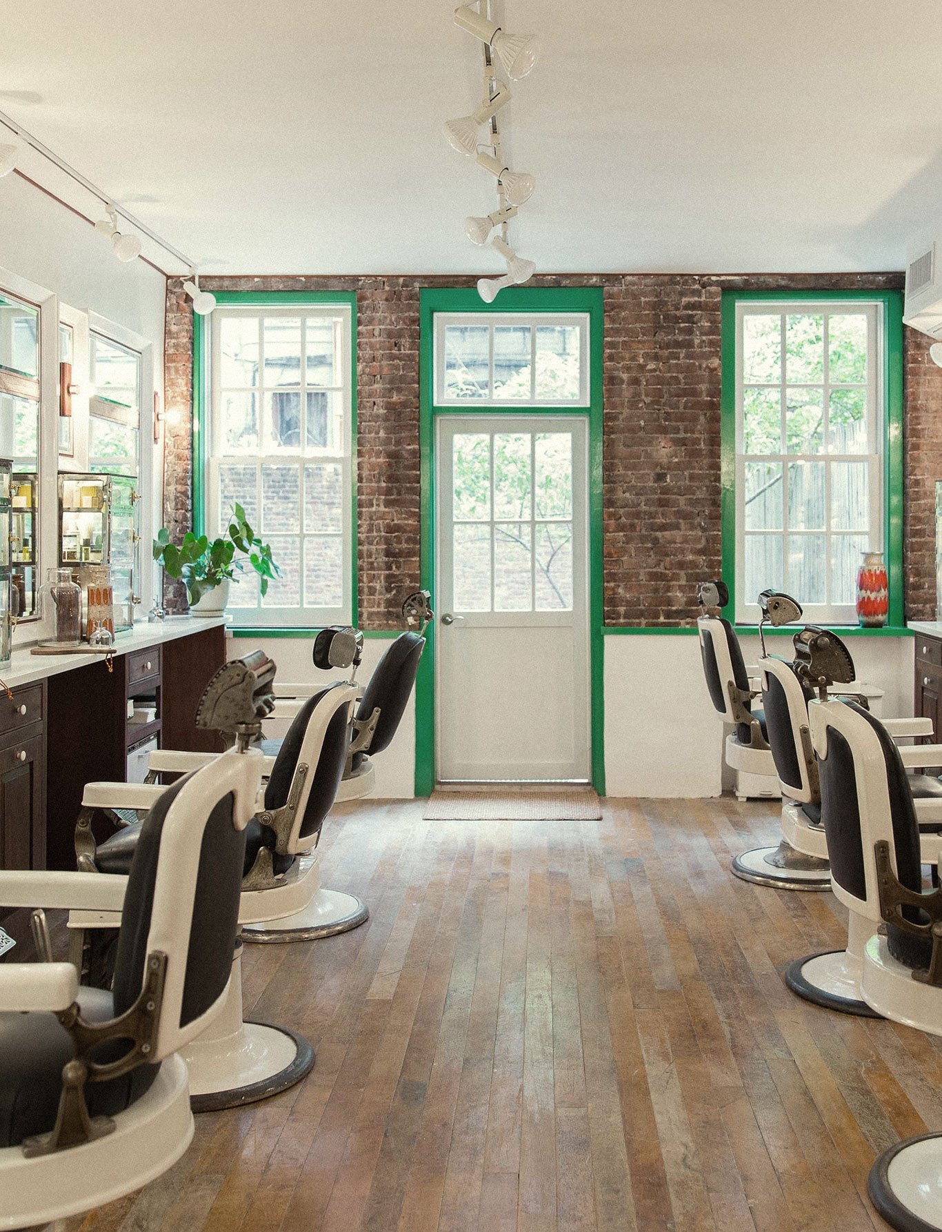 Interior of Fellow barbershop in Williamsburg, Brooklyn, branding by RoAndCo  