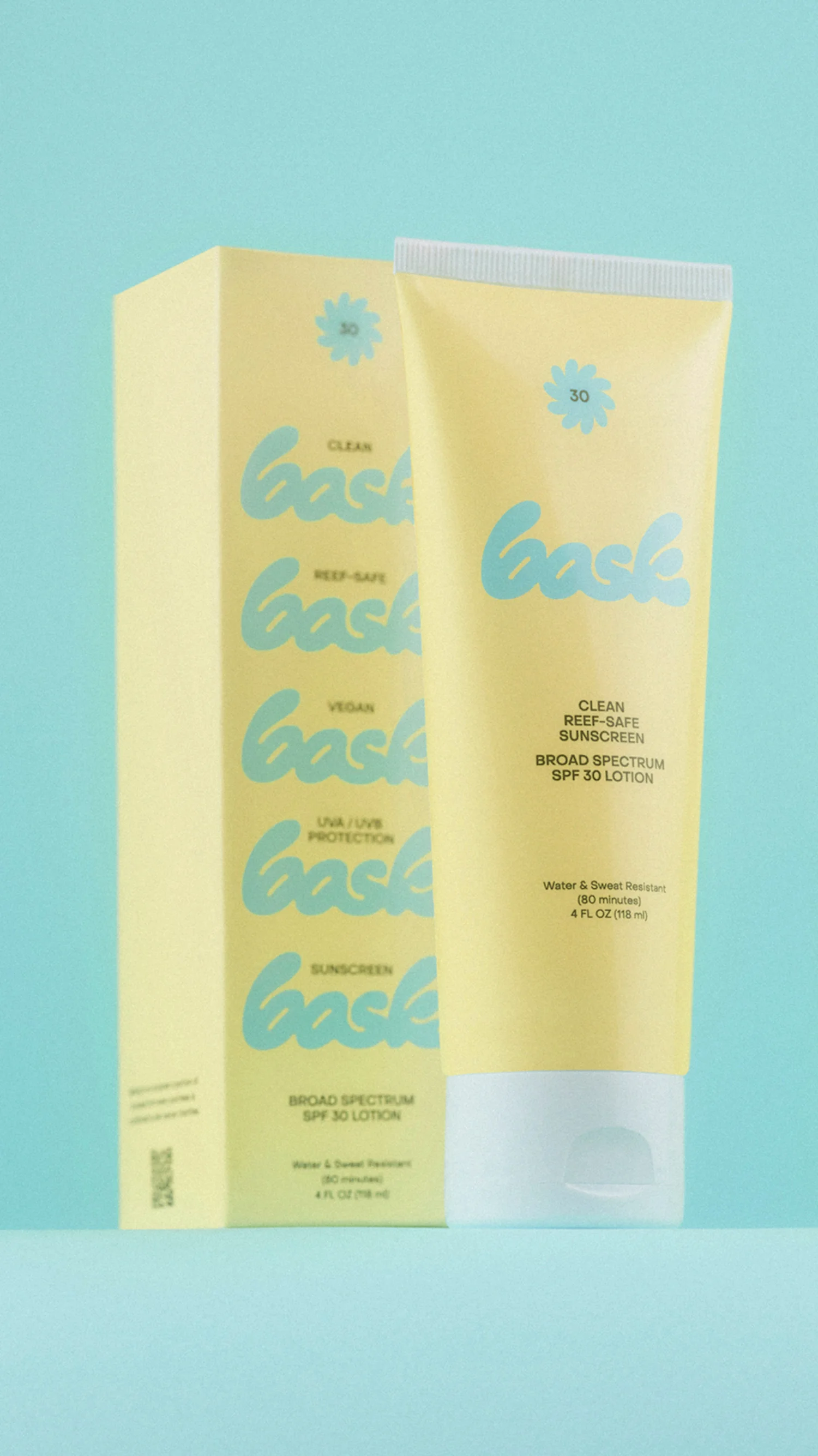 Bask Sunscreen Yellow Lotion Tube on Blue Background by RoAndCo