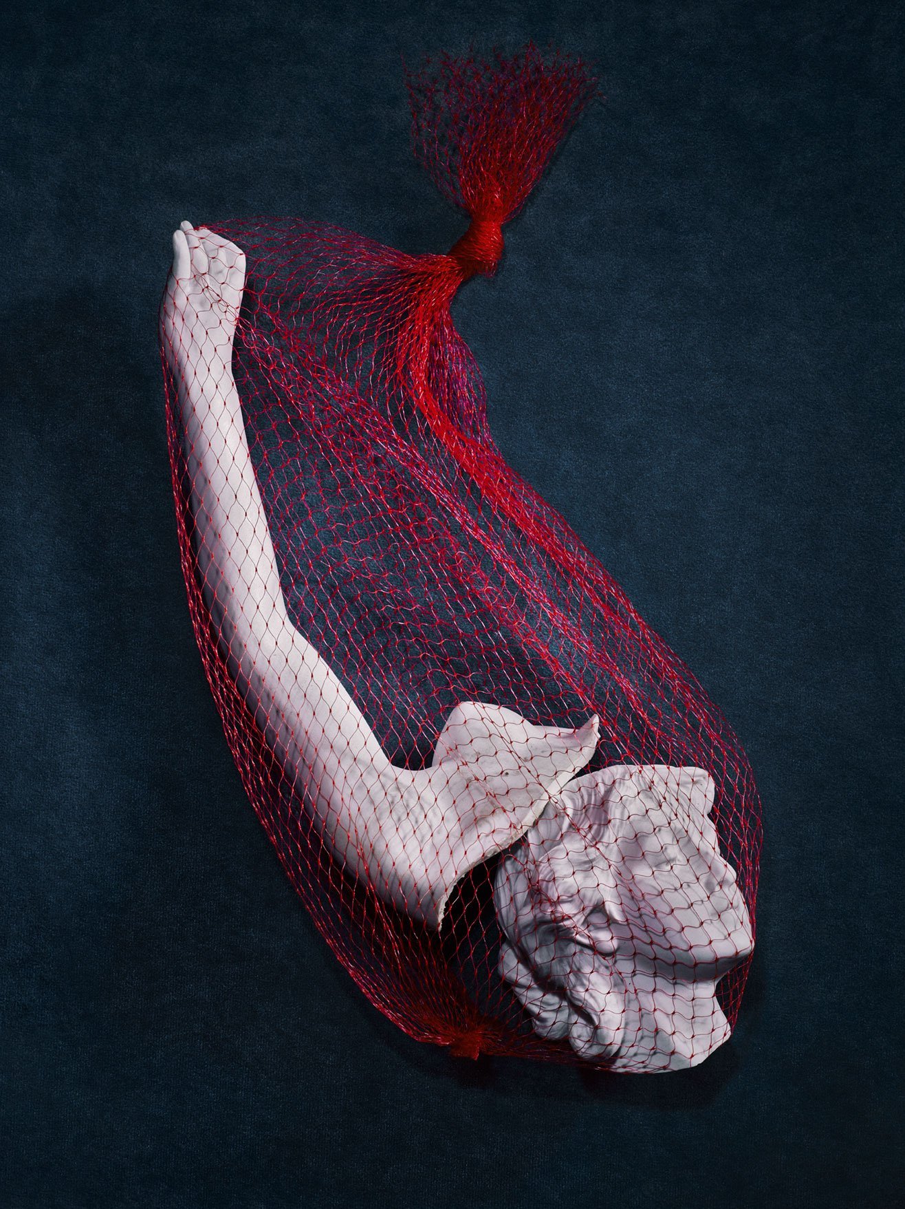 Sculpture in red netting for Romance Journal Issue 02 resistance. Publication design, art direction, print design by RoAndCo.