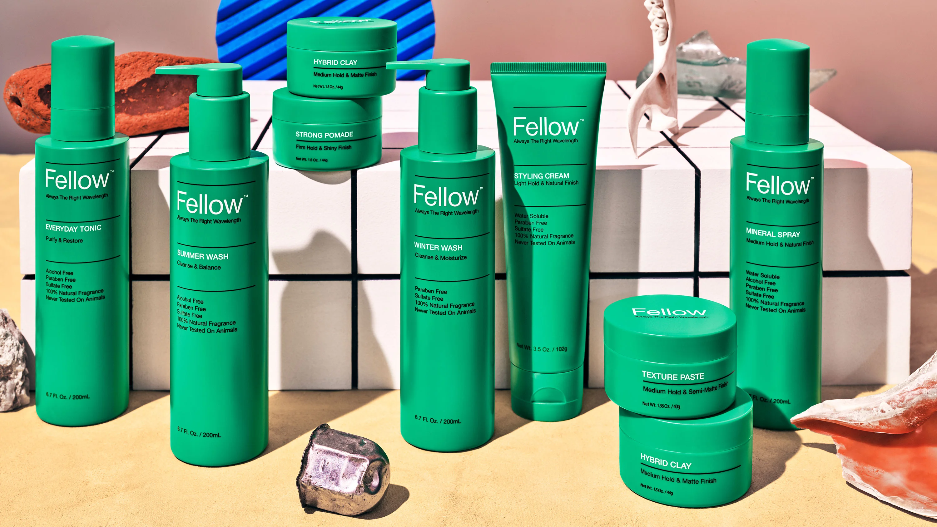 Fellow product suite on styled countertop, branding and packaging design by RoAndCo. Shot by Grant Cornett