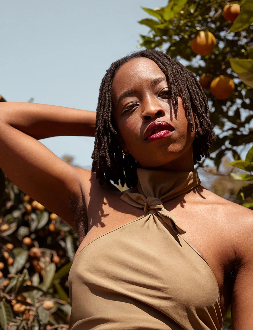 Erica Chidi Cohen, CEO and founder of Loom, in tan Gucci dress for Romance Journal Issue 03. Publication design, art direction, print design by RoAndCo. RoAndCo partnership with Gucci