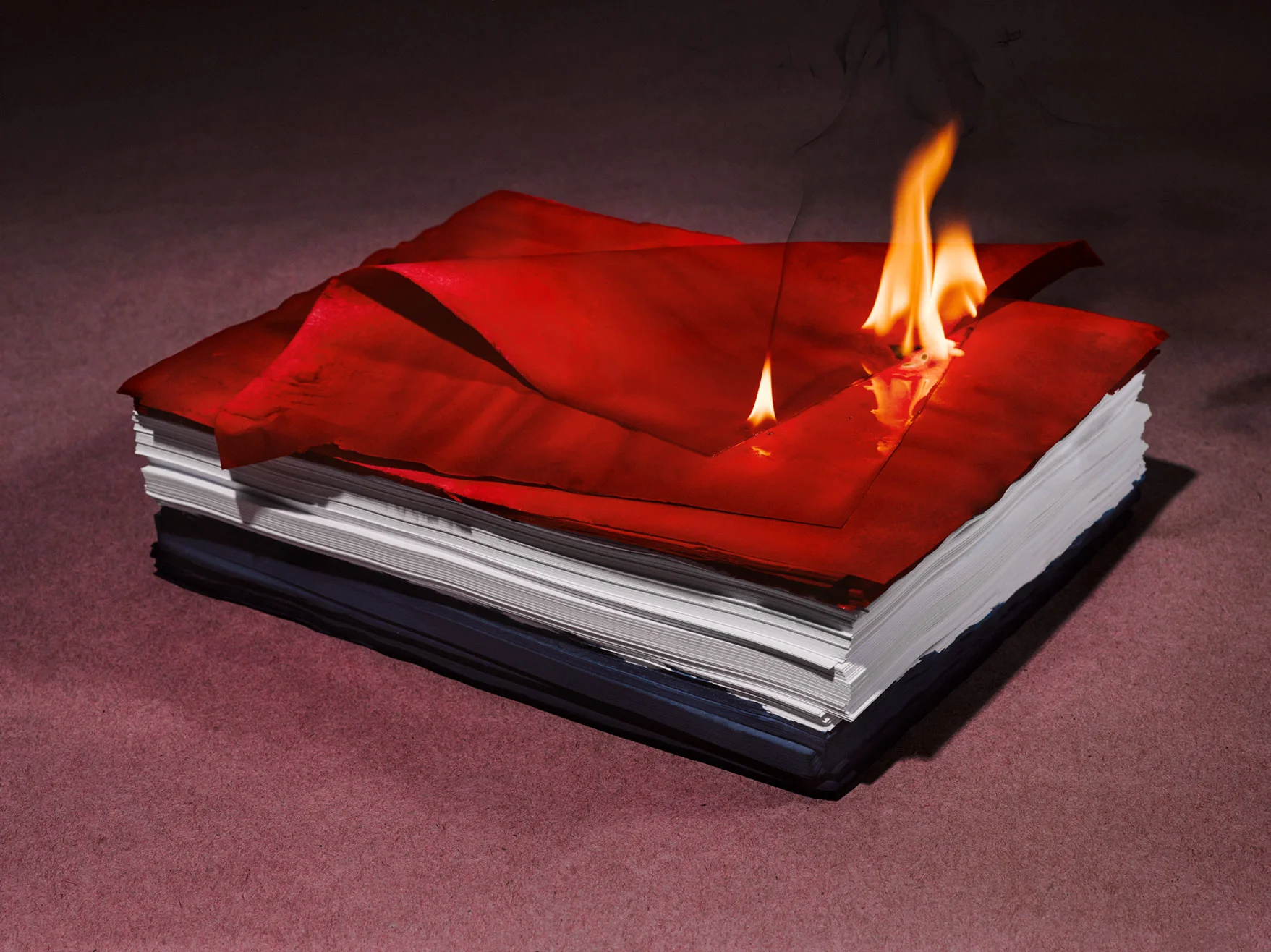Still life image of burning paper for Romance Journal Issue 02 resistance. Publication design, art direction, print design by RoAndCo.