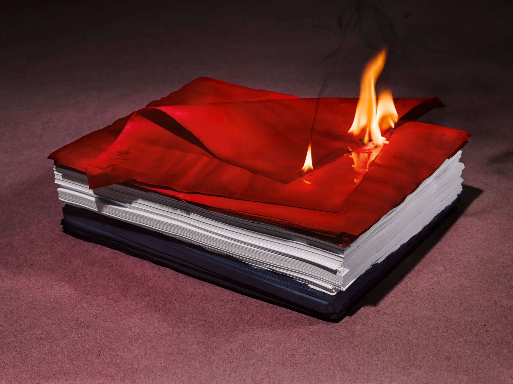 Still life image of burning paper for Romance Journal Issue 02 resistance. Publication design, art direction, print design by RoAndCo. 