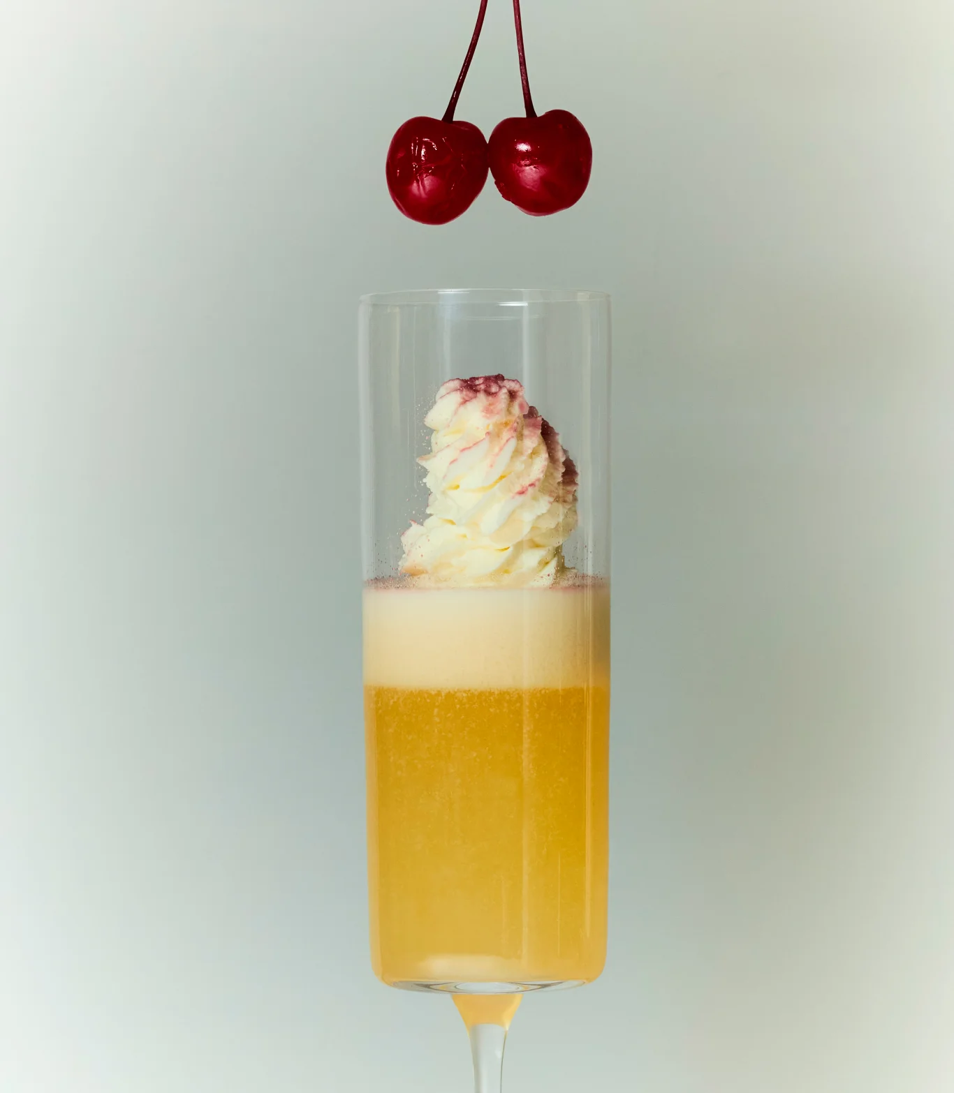 Gelee Art Direction, Gelee passion pearls in Martini glass on Orange Background