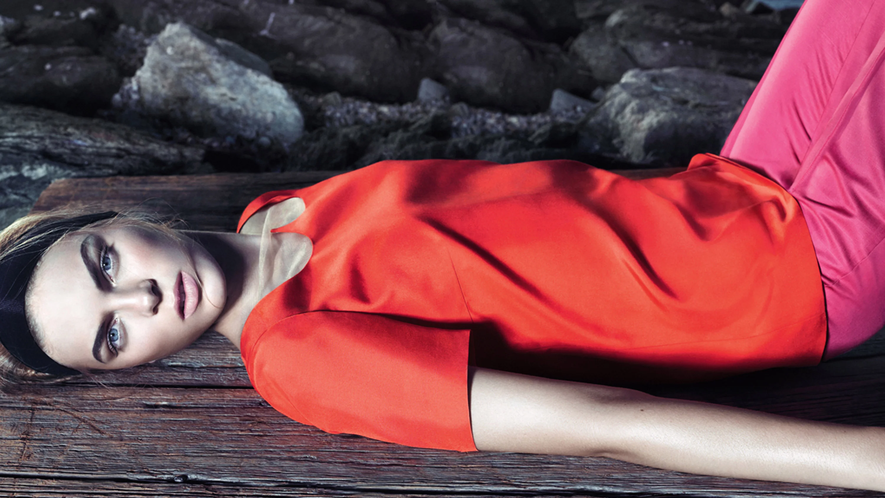 Model in red and pink Honor outfit, Art Direction for fashion campaign, by RoAndCo Studio