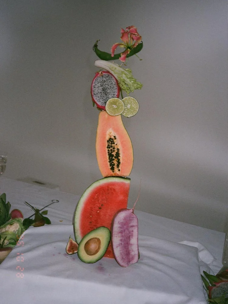 Behind the scenes campaign photo, tower of fruits and vegetables. Campaign Art direction by RoAndCo