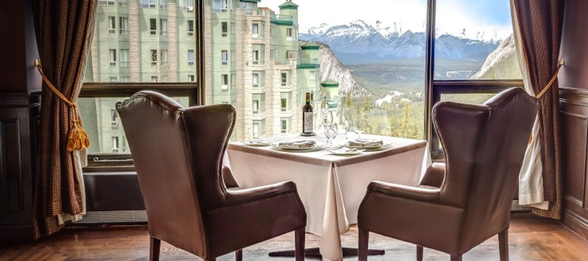 Table is set by the window at Eden restaurant, overlooking Banff