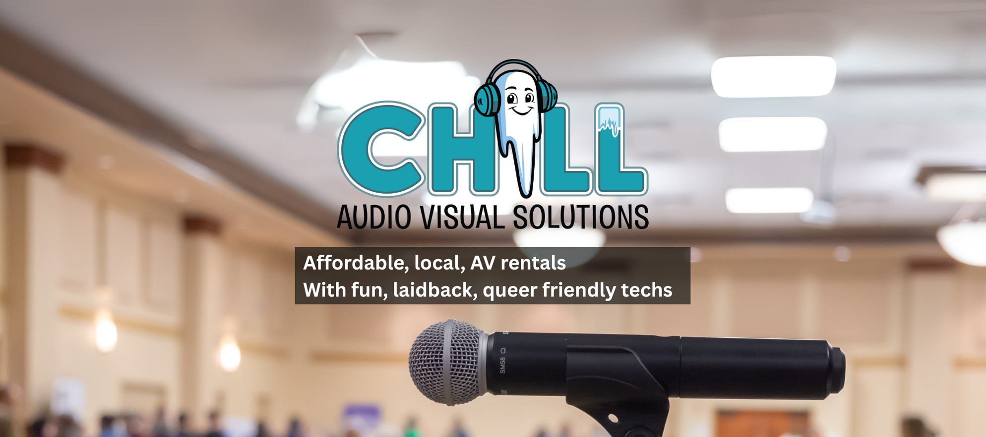 Microphone on a stand in the middle of a meeting room. Chill Audio Visual Solutions logo above.