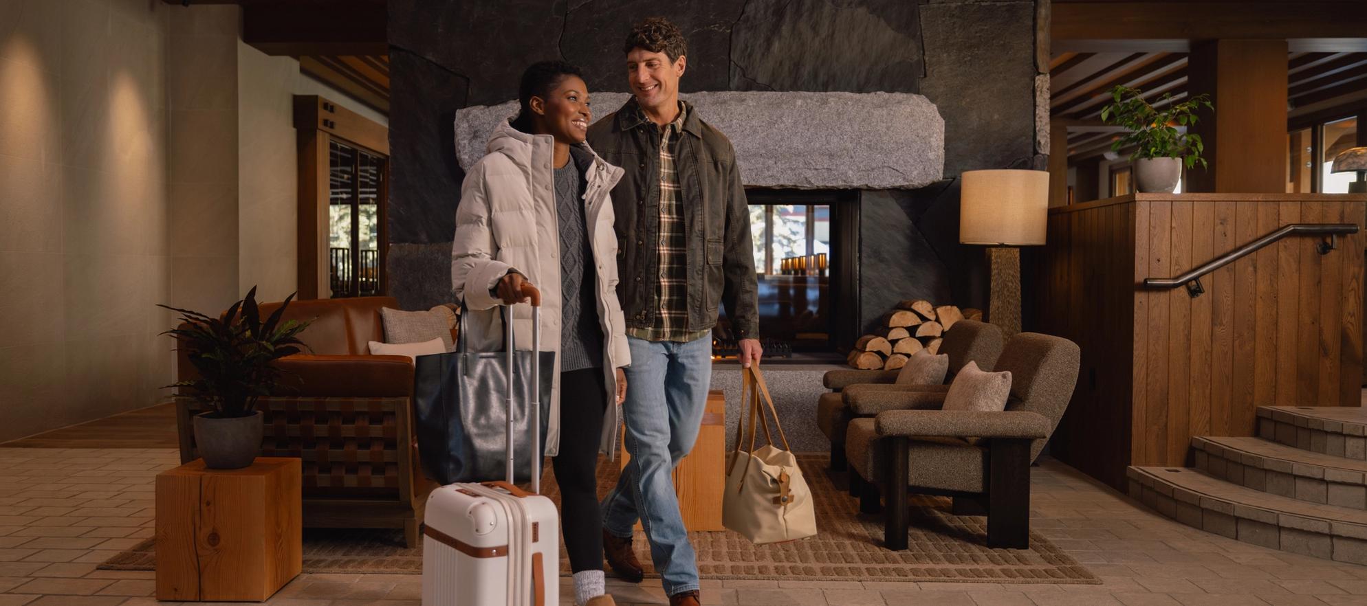 Couple checking into Otter Hotel