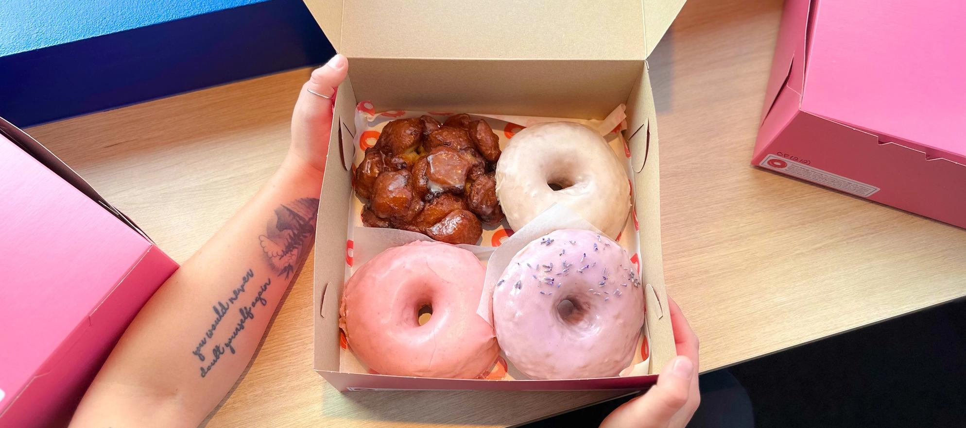 A box of doughnuts by Frankie D's Donuts