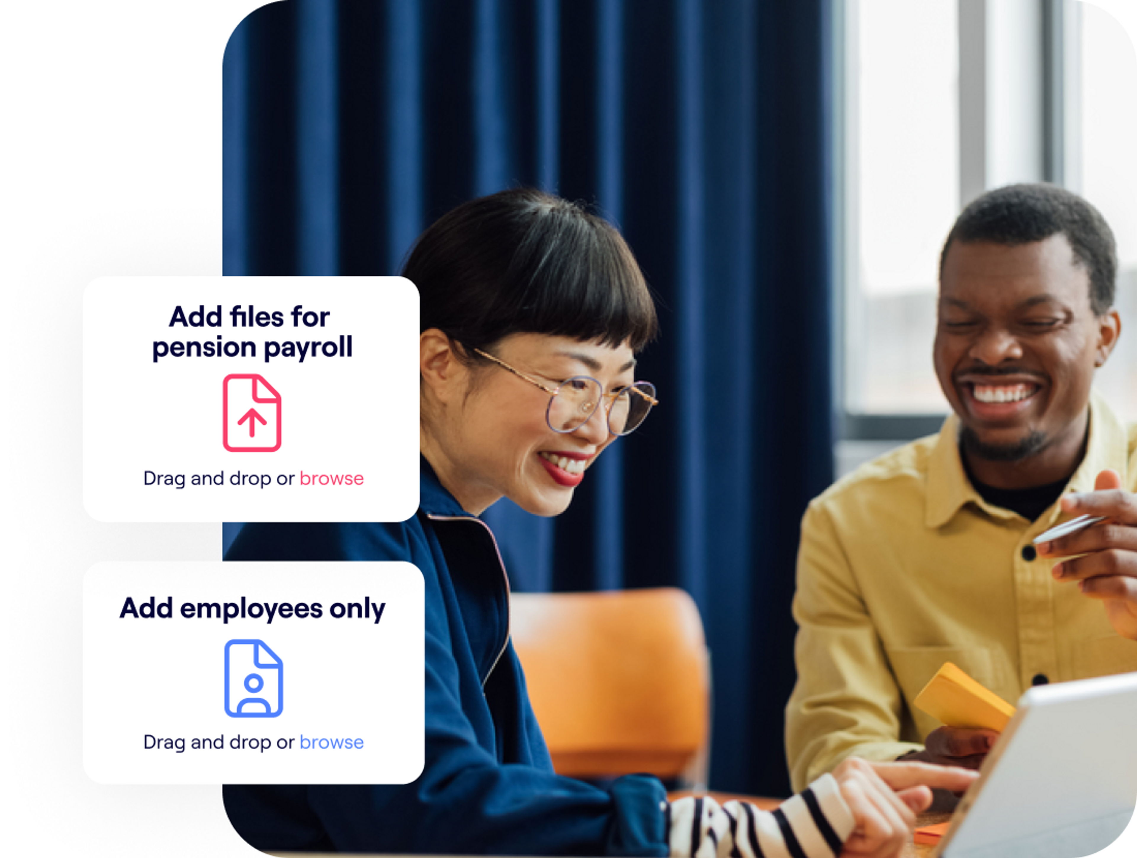 A photo of a woman smiling while looking at a laptop