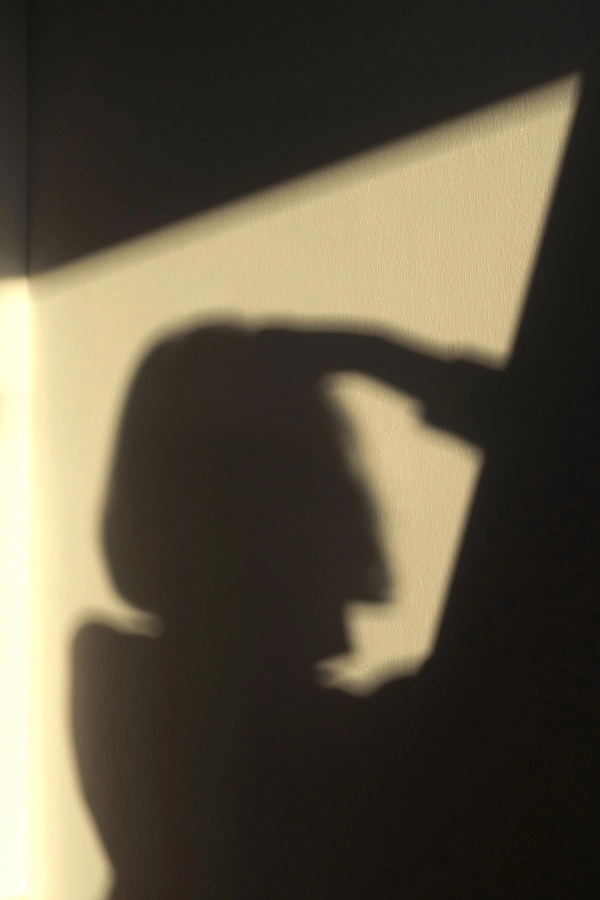 Shadow of a woman on a wall