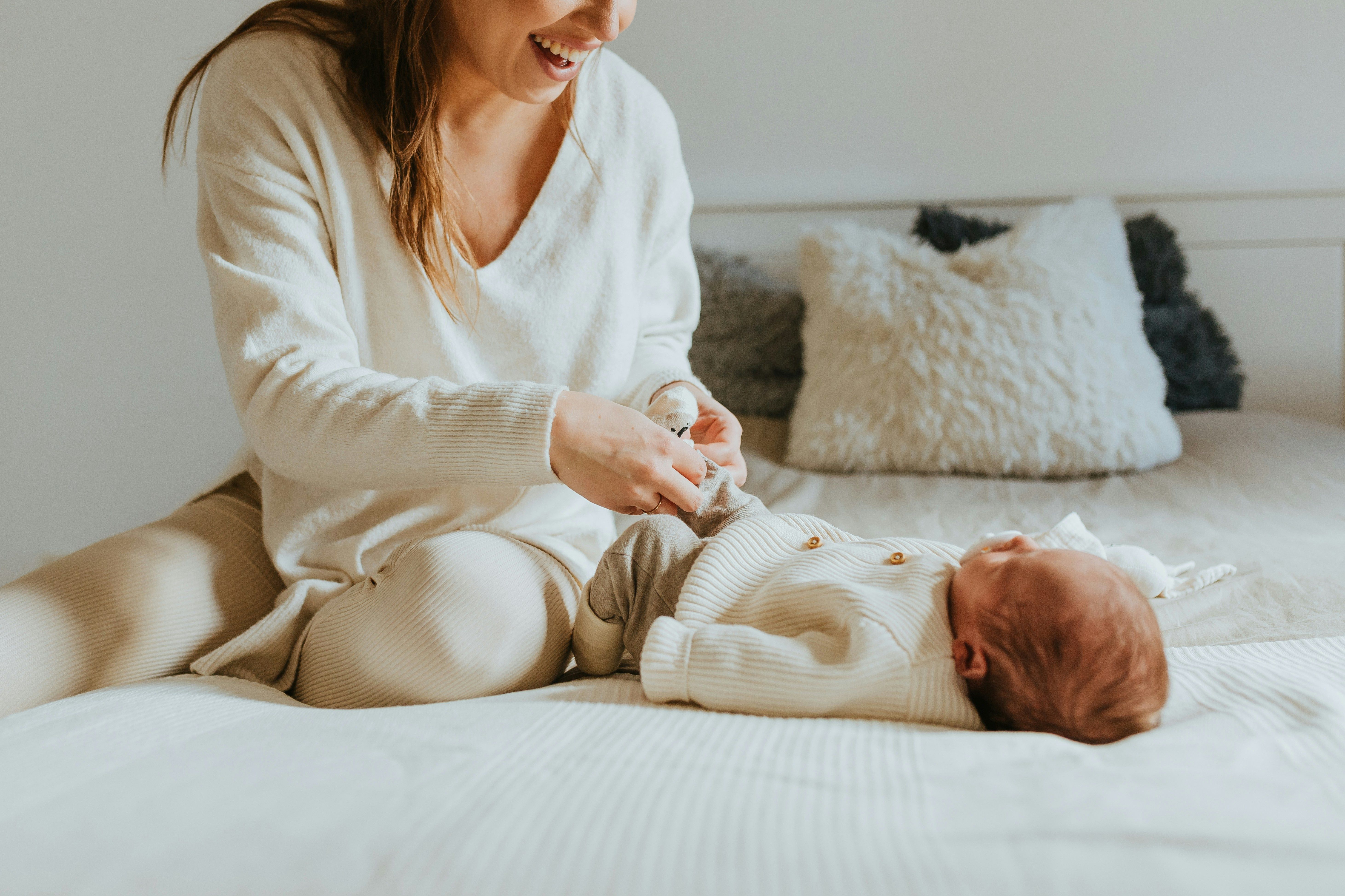 Mother and Baby on bed