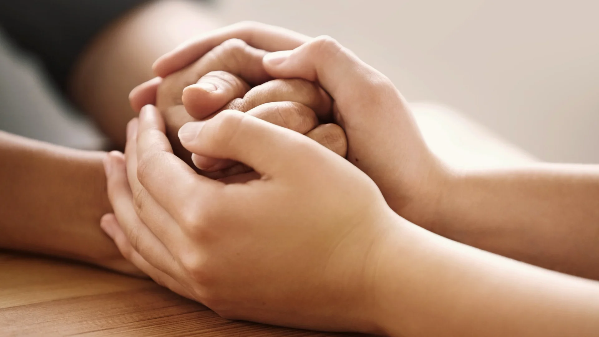 Hands Holding in Care