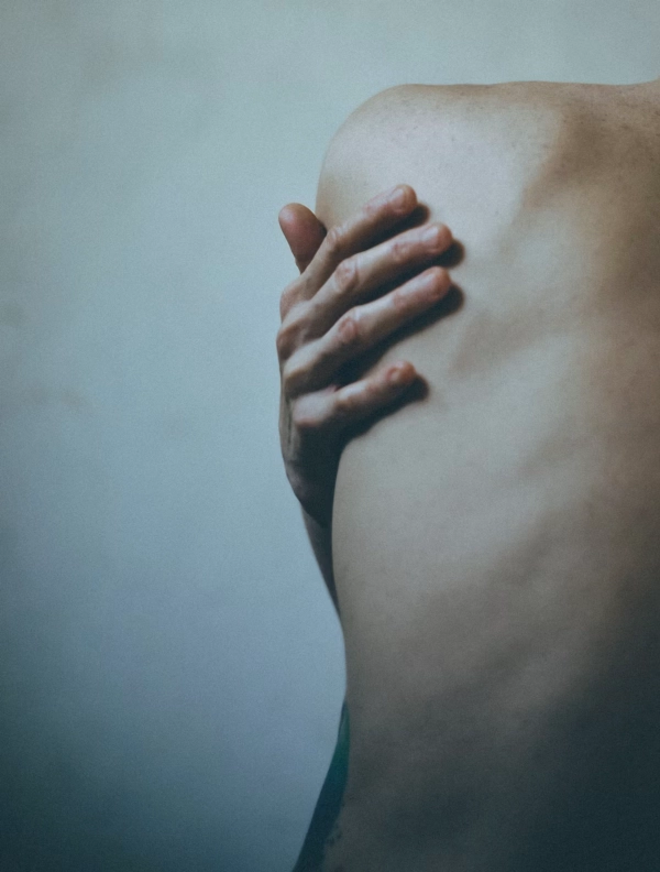 Hand on a back
