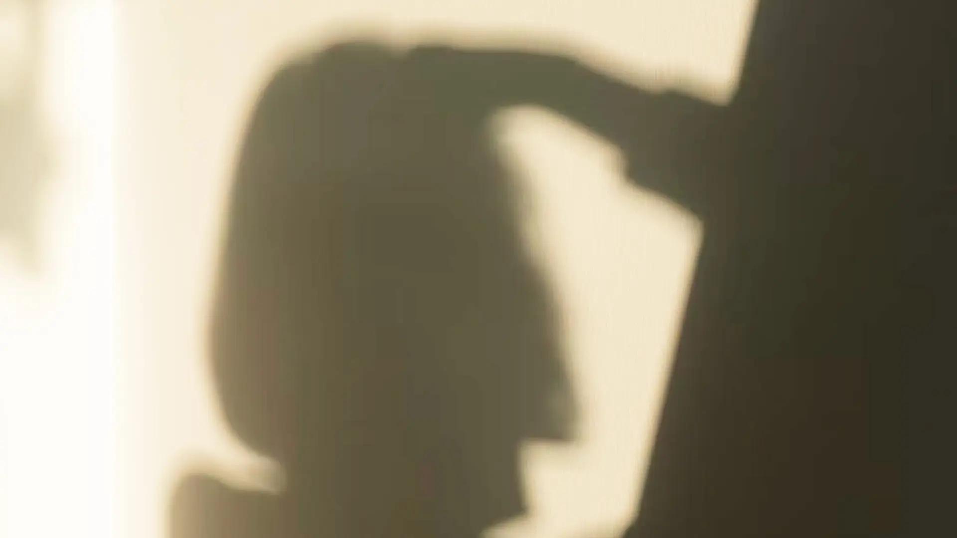 Mental health and addiction a person taking a picture of her own shadow