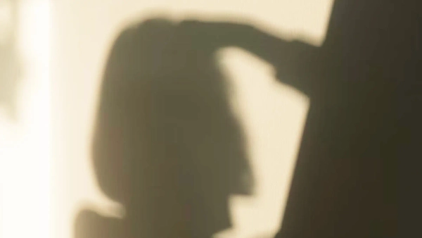 Mental health and addiction a person taking a picture of her own shadow